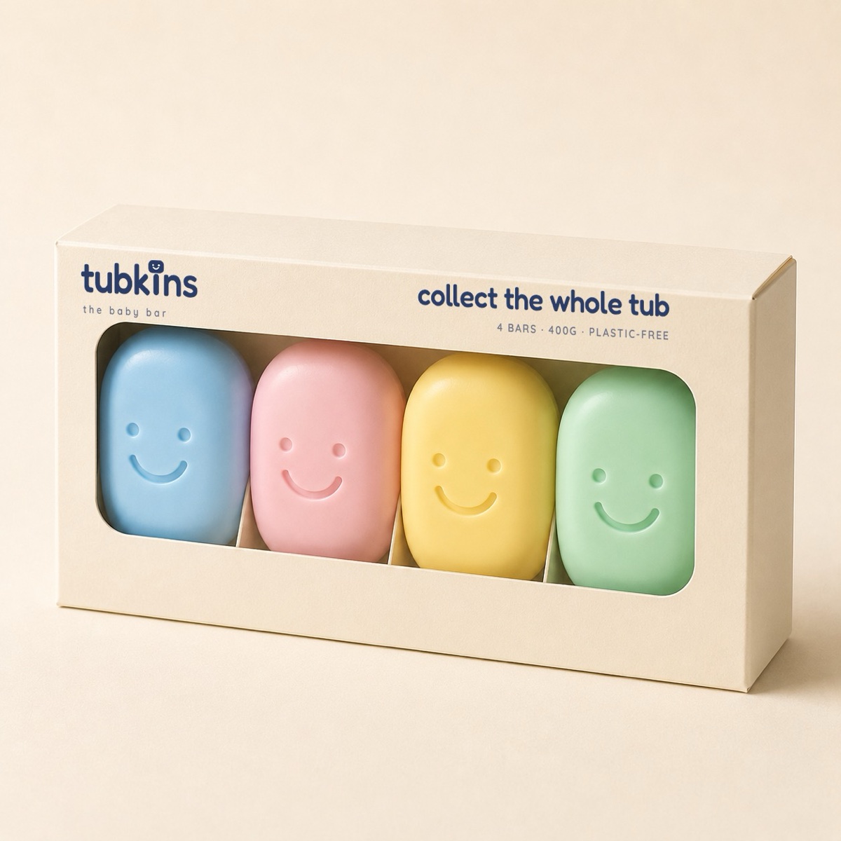 A cream Tubkins gift box printed 'collect the whole tub', window showing all four colorful characters.